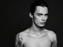 The Tattoo Near His Collarbone Translates To I Believe In Fairies Peter Pan Was One Of His Favorite Children S Books Compass Tattoo Tattoos Tattoos For Guys