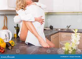Couple Having Sex on Kitchen Counter Stock Image - Image of person,  embrace: 69035519