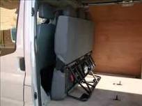 Folding seat fitted in van