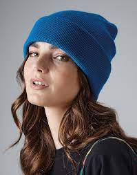 The ribbing is eaten up in the decreases as opposed to spiraling for nice effect in the finishing. Original Cuffed Beanie