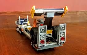 The ramps go up and down, the trailer has some suspension, and the ball and hitch connection swivels and can handle some rotation. Lego Dragster Kit Review One Outstanding Unbranded Build