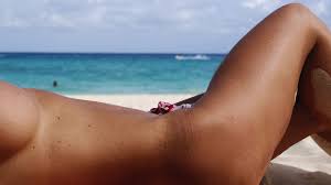 Nude beach tan