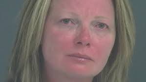 Woman accused of stabbing husband in the chest with a pencil