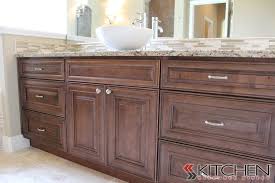 This Bathroom Uses Our Bristol Rta Cabinets In Maple Chocolate Glaze Finish It S Paired With A Bright White Vess Wood Kitchen Blue Kitchen Decor Wood Cabinets