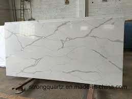 Gold calacatta quartz slab being unveiled at the mayfair granite factory, see link below for more information. China Artificial Slab Calacatta Gold White Quartz Stone Slab For Kitchen Countertop 2cm 3cm China 2cm Calacatta White Quartz Engineered Stone