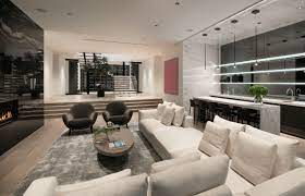 When decorating a large room, it helps to arrange furniture to create individual spaces that work together as a whole. 80 Stylish Modern Living Room Ideas Photos Big Living Room Design Big Living Rooms Black And White Living Room
