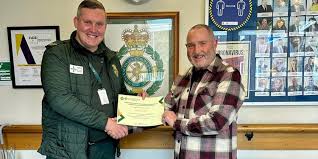Welsh Ambulance Service volunteer retires after 33 years