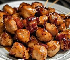 Maple Glazed Bacon Chicken Bites What You'll Need For This Recipe  Ingredients: 1 lb chicken breast, cut into bite-sized pieces – Provides the  core protein, giving each bite substance and tenderness. 8