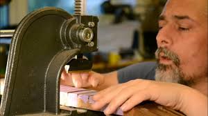 Pressing frets (with hide glue)
