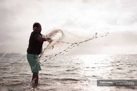 Select from premium throwing fishing net of the highest quality. Fisherman Throwing Fishing Net On The Beach At Dusk Sea Mixed Race Stock Photo 207484522
