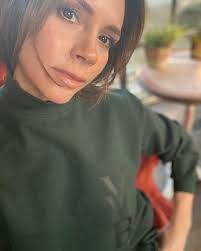 Victoria Beckham lounges in a TRACKSUIT as she ditches polished look to  cuddle her dog at her Cotswolds home