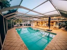 A swimming pool, swimming bath, wading pool, paddling pool, or simply pool is a structure designed to hold water to enable swimming or other leisure activities. Pool Enclosures Suncoast Enclosures