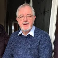 Às dèidh 18 bliadhna aig Bòrd na Gàidhlig, tha sinn a' fàgail soraidh slàn  aig Ailig Greumach, Ceann an Ionmhais, is e a' leigeil dheth a dhreuchd.  Tha sinn a' toirt taing