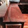 Red wood kitchen white kitchen bench. 3