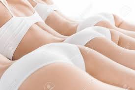 Woman legs before and after slimming. Young Women In White Underwear Lying On Bed Stock Photo Picture And Royalty Free Image Image 80923131