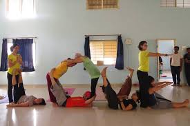 kids yoga teacher and