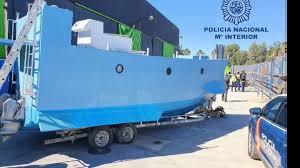 Spanish nouns have a gender, which is either feminine (like la mujer or la luna) or masculine (like el hombre or el sol). Spanish Police Seize Narco Submarine In Malaga Raid Bbc News