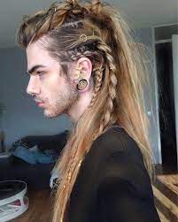 Long hair is super sexy and looks great on a lot of men out there, so if you're daring enough to try on some lengthier locks, then consider a sexy faux hawk like this. 10 Bold Ways To Style Faux Hawk Braids For Men Cool Men S Hair
