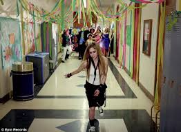 Dressed in a local authority tee and a striped tie reminiscent of those she. Here S To Never Growing Up Avril Lavigne Hasn T Aged A Day As She Channels Her Teen Years In New Music Video Braceletchinahf