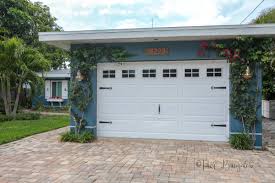 From a distance you can't tell these carriage garage doors are faux. How To Make Faux Garage Door Windows H2obungalow
