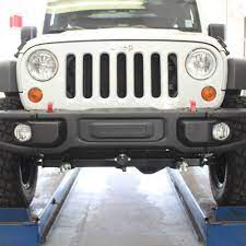 Installation of tow bar hookup points for our 1996 jeep cherokee. Forget Flat Towing Problems W Blue Ox Bsplt Kits 94 6347