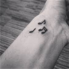 Music note tattoo on wrist. Music Notes Tattoo Wrist Music Tattoos Music Notes Tattoo Note Tattoo