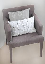 Reupholster the back of the wingback chair take the new upholstery pattern that you have cut out for the back of the chair and drape it over the chair's back. How To Reupholster A Wingback Chair Home Quicks