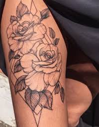 Tiny rose tattoos are a perfect fit if you're looking for something girly and delicate at the same time. Thin Lined Simple Yet Slightly Animated Rose Thigh Tattoo Rose Tattoo Thigh Thin Line Tattoos Side Thigh Tattoos