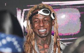 There are images covering the tattoos on weezy's face, ears, neck, shoulders, chest, back, arms, hands, fingers, and legs. Lil Wayne Gets More Facial Tattoos
