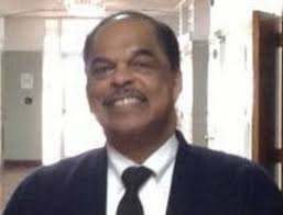 Veteran Birmingham educator Sidney Moore retires as principal of Holy  Family Catholic High School