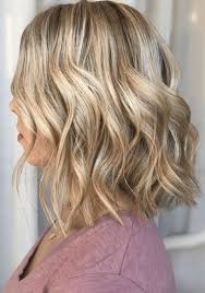 The hair is cut into a pixie style with a side part and it has gorgeous honey highlights. Trendy Hair Color Balayage Beautiful Short Blonde Bob With Highlights Hipster Fashion Leading Hipster Style Fashion Magazine Making Fashion Pop