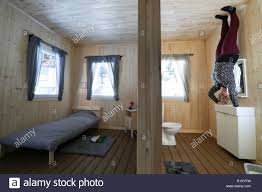 an employee holds onto the sink in the