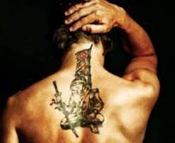 There is the word 'blessed' behind his ear. Fernando Alonso And His Wow Tat Tattoos Body Art Tatting