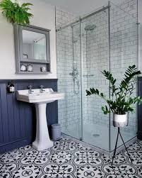 It S All About The Monochrome Tiles And Beautiful Dark Blue Panelled Wood Bathroom Interior Design Blue Bathroom Tile Bathroom Interior