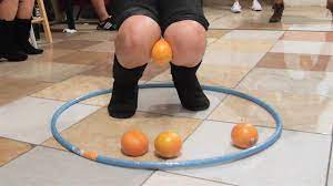 Minute To Win It Knee Trembler 2 Vs 2 Youth Games Youth Group Games Group Games