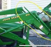Bucket level indicator for 410 loader