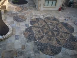 The Flower Of Life Cobble And Pebble Mosaic Finished Happy Day Www Wildeartthworks Com Stone Cobbles Gardendesig Pebble Mosaic Flower Of Life Stone Mosaic