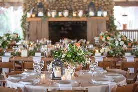 We Love The Antique Details At This Outdoor Wedding Reception At Serenbe With Oil Rubb Outdoor Wedding Reception Floral Container Wedding Reception Decorations