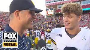 Michigan HC Jim Harbaugh and QB J.J. McCarthy