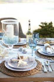Putting shells or starfish on each plate or making favors of them is awesome. 46 Charming Beach Wedding Table Settings Happywedd Com