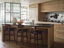 This luxurious marble kitchen is proof that marble blends effortlessly well with other elements such as wood, brick, and stainless steel. 22 Charming Wood Kitchens Kitchens With Wood Finishes