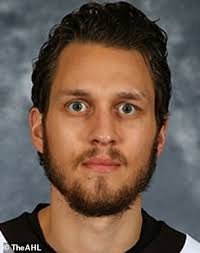 Frightening moment minor league hockey player gets KNOCKED OUT during  on-ice fight