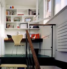 This small home office features a modern wood desk that's easily tucked into one corner of the transforming an interior bay window into a study nook takes advantage of natural light and extra 10 smart design ideas for small spaces. 20 Home Office Design Ideas For Small Spaces