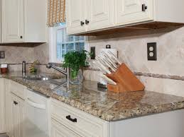 A hard slab of granite, or quartz, including edges and backsplashes, goes on top of the existing countertop. How To Install A Granite Kitchen Countertop Hgtv