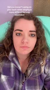 Why Do People Lay Down While Singing