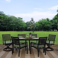 The dimensions of the table are 38d x 63w x 29.5h, and the dimensions of chairs are 23.5d x 26.25w x 35.5h. Get Vogue 7 Piece Cast Aluminum Outdoor Patio Furniture Dining Set In Mi At English Gardens Nurseries Serving Clinton Township Dearborn Heights Eastpointe Royal Oak West Bloomfield And The Plymouth Ann