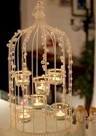 Birdcage planters are a great way to get creative and personalize a space, no matter how big or small! Bird Cage Decorating Ideas Decorating Ideas Bird Cage Decor Bird Cage Centerpiece Bird Cages