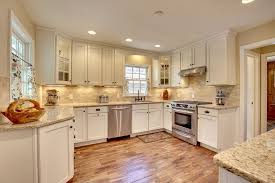 Traditional Kitchen With Giallo Ornamental Granite Ms International Stone Tile Hardwood Floors New Kitchen Cabinets Traditional Kitchen Kitchen Tiles Design