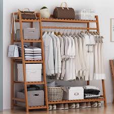 Basic wardrobe cabinets typically are designed into three spaces that can be equal or different widths. Wooden Clothes Rack Clothes Storage Clothes Wardrobe Cabinet Hanging Rack Shopee Malaysia