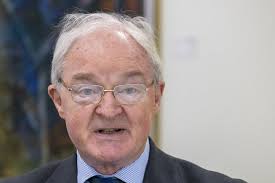 Legacy commission chair Sir Declan Morgan remains determined in the face of  criticism